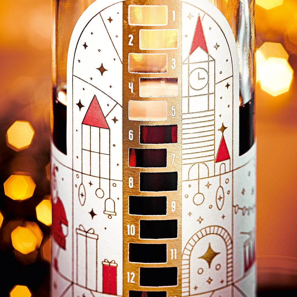 Skala Wajos Adventskalender Flasche gefüllt mit Gewürzpflaumen Likör