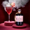 Elixier d&#39;Amour Liqueuer dargestellt mit Cocktail